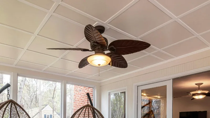 Ceiling fan with a light in a sunroom